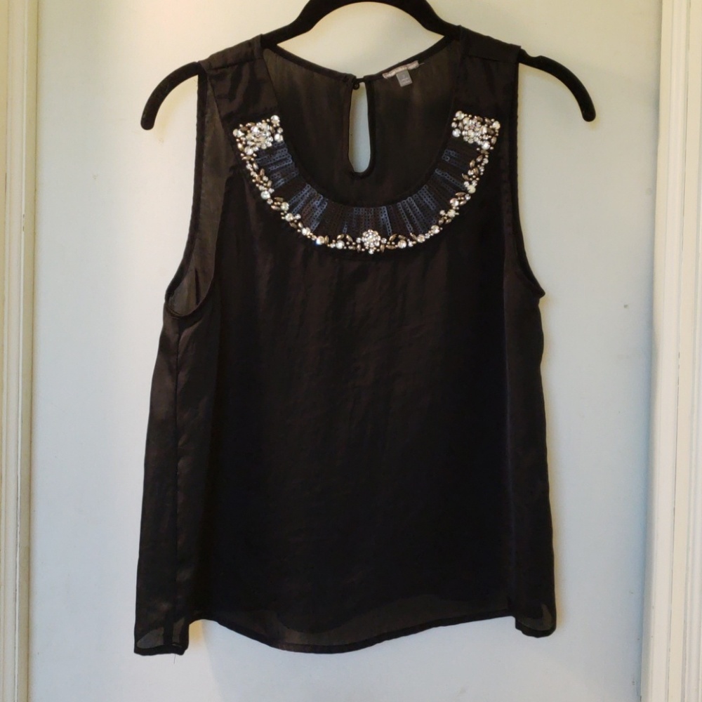Black sequined casual top with a shiny neckline